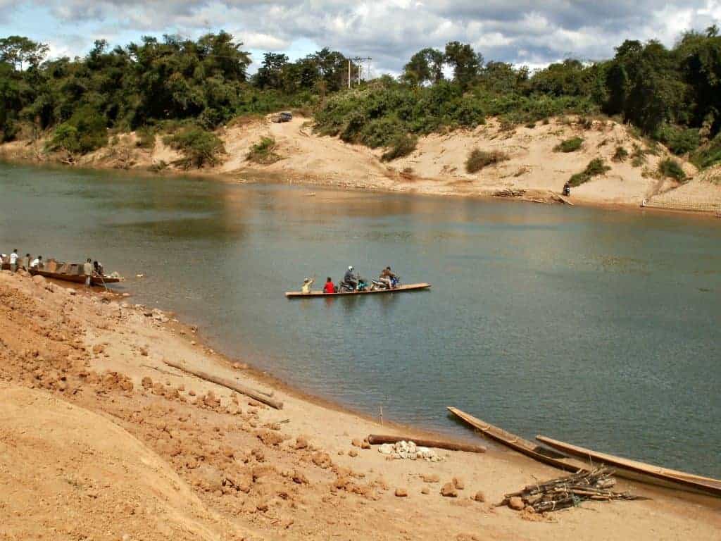 river-crossings-Laos-Ho-Chi-Minh-Trail-small-ferry-used-for-crossing