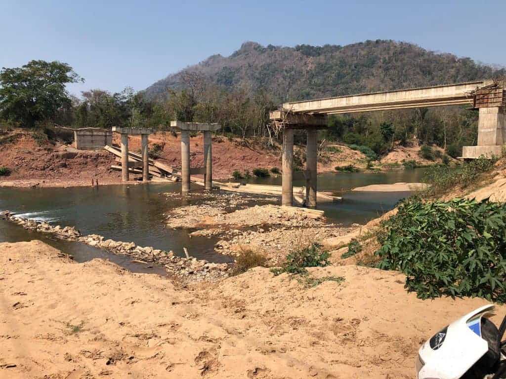 river-crossings-Laos-Ho-Chi-Minh-Trail-incomplete-bridge-flooded-ford